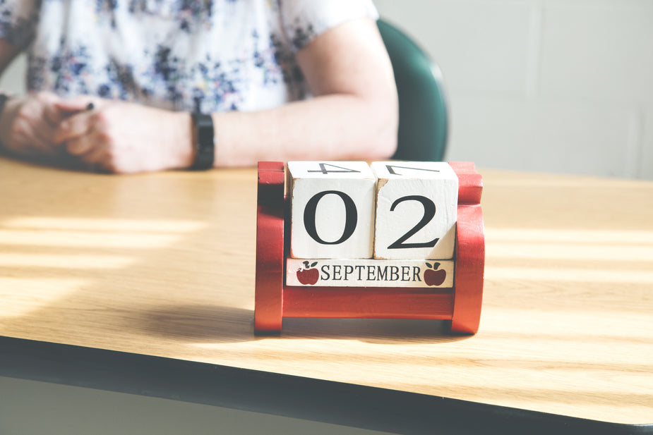 Desk calendar and school materials for education planning workflows